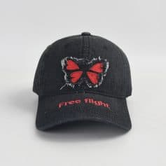 Free flight embroidered butterfly cap, trendy black baseball hat with distressed detail, stylish accessory for casual wear, ideal for outdoor activities, perfect for fashion-forward individuals.