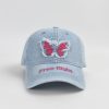 Butterfly embroidery denim cap with "Free Flight" text, trendy accessory, casual hat, fashion statement, lightweight cotton, adjustable strap, unisex style, summer hat, stylish headwear, accessory for outdoor activities.