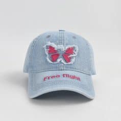Butterfly embroidery denim cap with "Free Flight" text, trendy accessory, casual hat, fashion statement, lightweight cotton, adjustable strap, unisex style, summer hat, stylish headwear, accessory for outdoor activities.