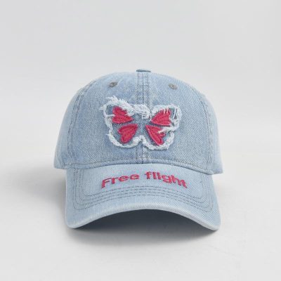 Butterfly embroidery denim cap with "Free Flight" text, trendy accessory, casual hat, fashion statement, lightweight cotton, adjustable strap, unisex style, summer hat, stylish headwear, accessory for outdoor activities.