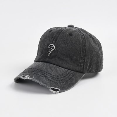 Question mark embroidered distressed denim baseball cap, black adjustable hat with ripped details.