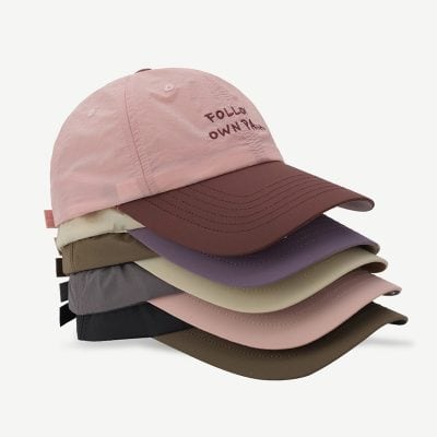 Pink and brown adjustable baseball caps with embroidered text, stylish for casual wear. Perfect accessories for sun protection and fashion, available at Monalisa Store for trendy eyewear and accessories.