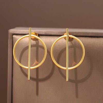Gold geometric hoop earrings, elegant jewelry accessory, perfect for fashion-forward individuals, stylish gift idea, luxury gold-tone earrings for women.