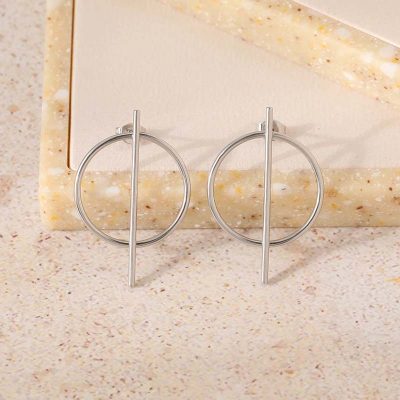 Minimalist silver hoop earrings with vertical bar detail for modern women's jewelry.
