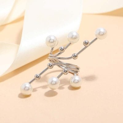 Elegant pearl brooch jewelry accessory for women and girls, perfect for special occasions or daily wear.