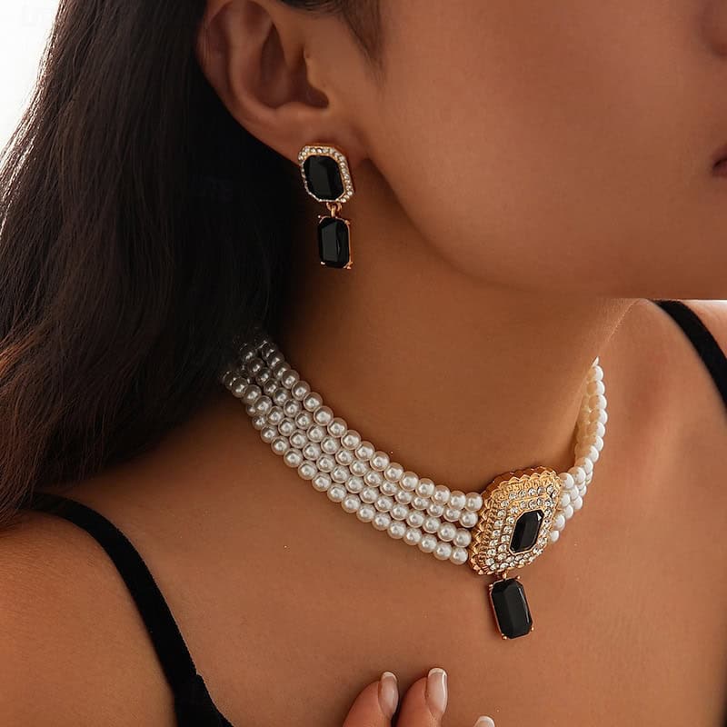 Elegant pearl choker necklace with black gemstone pendant and matching statement earrings, perfect for fashionable and sophisticated women seeking luxury jewelry at Monalisa Store.