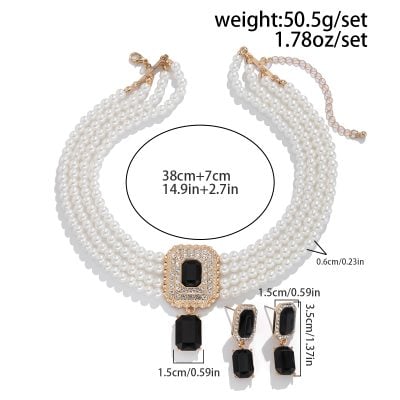 Elegant pearl necklace and matching earrings with black gemstone accents, perfect for special occasions, featuring detailed measurements and a luxurious design.