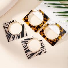 Stylish statement earrings with geometric tortoise and zebra print designs, perfect for fashion-forward accessories. Ideal for enhancing your outfit with bold, trendy jewelry.