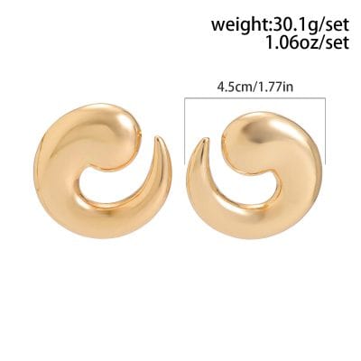 Shiny gold statement earrings with a modern, spiral design, perfect for fashionable accessories.
