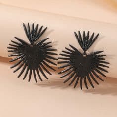 Stylish black statement earrings with sunburst design, perfect for adding a bold accessory to your look. Made from lightweight material, ideal for casual or formal occasions.