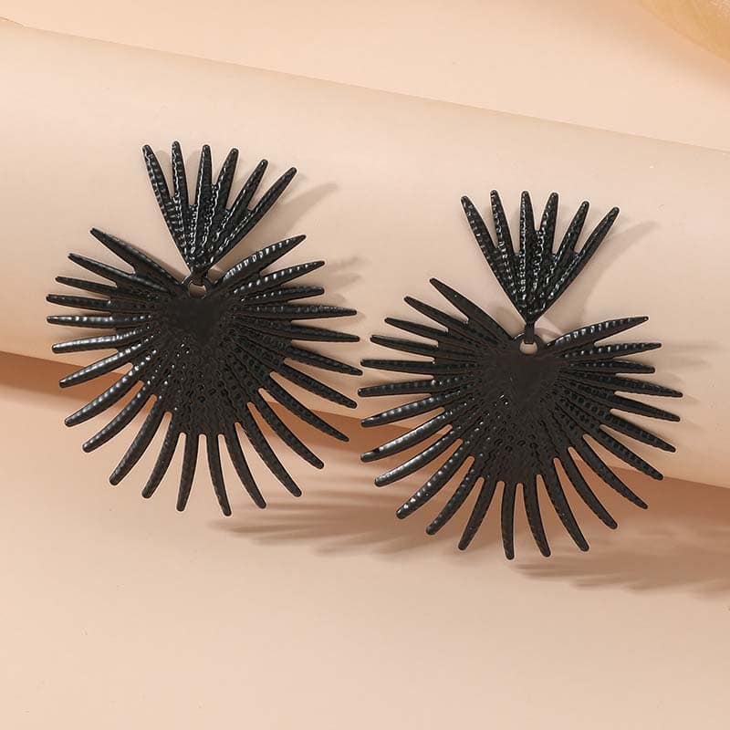 Stylish black statement earrings with sunburst design, perfect for adding a bold accessory to your look. Made from lightweight material, ideal for casual or formal occasions.