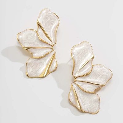 Elegant butterfly jewelry ornaments with white and gold accents, perfect for stylish accessories and jewelry collections. High-quality decorative pieces for fashion enthusiasts.