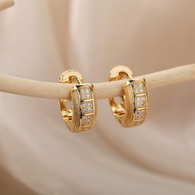 Beautiful gold hoop earrings with diamond accents from Monalisa Store, perfect for elegant jewelry collections and special occasions.