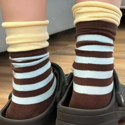 Comfy striped socks inside medical slippers for enhanced foot comfort at Monalisa Store.