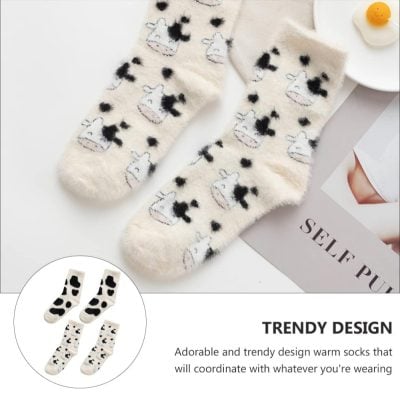 Soft cozy cow print socks with adorable black and white design perfect for gift sets and casual wear.