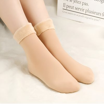 Soft beige silicone doll legs with plush ankle socks, ideal for realistic art, display, or medical training purposes at Monalisa Medical Store.
