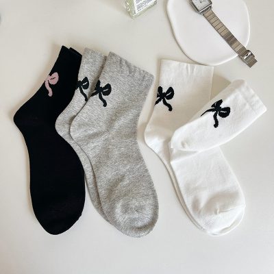 Fashionable ankle socks with bow design, available in black, gray, and white, perfect for casual wear and sock shopping at Monalisa Store.