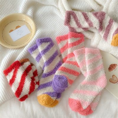 Soft colorful striped fuzzy socks with playful polka dot heel details for comfortable everyday wear at Monalisa Store.