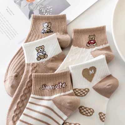 Cute teddy bear patterned socks in neutral tones, perfect for children and adults, available at Monalisa Store for cozy, stylish footwear.