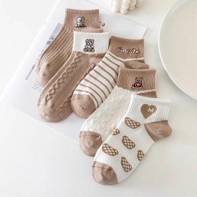 Colorful cartoon teddy bear socks for kids, beige, white, and brown with various fun patterns and embroidered bear designs, perfect for baby and children’s footwear by Monalisa Store.
