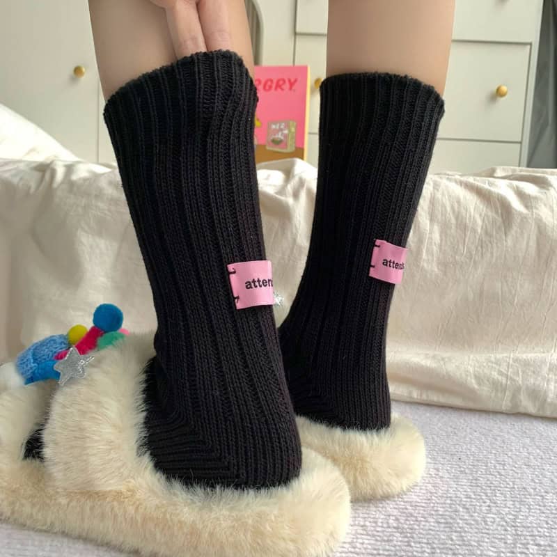 Cute cozy black knit socks with plush fur soles, perfect for winter comfort and indoor wear, by Monalisa Store.