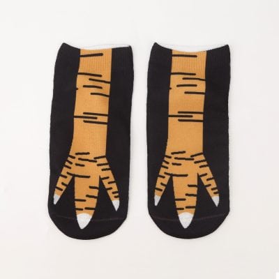 Comfortable novelty tiger-striped socks with black and orange design, perfect for casual or fun occasions. Ideal for animal print enthusiasts and sock collectors.