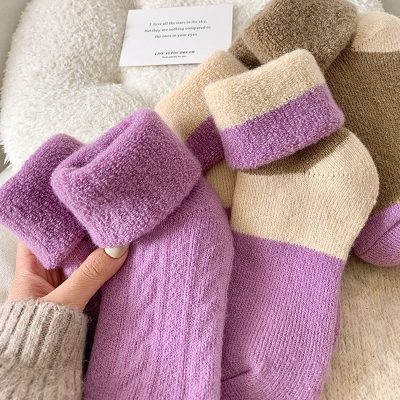 Soft pastel-colored socks with beige, purple, and pink tones, perfect for cozy, stylish comfort and everyday wear. Ideal for fashion-forward casual dressing and gift-giving.