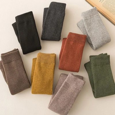 Soft knit socks in various colors, perfect for comfortable everyday wear and stylish accessories.