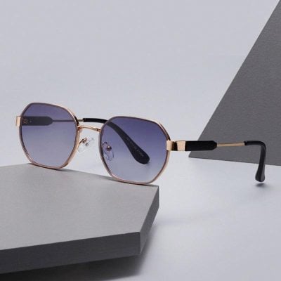 Luxury designer sunglasses with rose gold frame and dark tinted lenses for women and men.