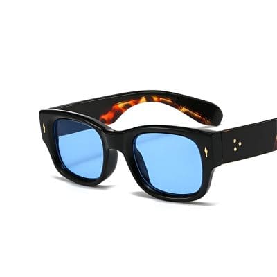 Fashionable black sunglasses with blue mirrored lenses, perfect for sun protection and stylish accessories. Ideal for outdoor activities and a trendy look. Monalisa Store offers premium eyewear collections.