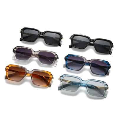 Stylish designer sunglasses with bold frames and tinted lenses, perfect for fashion-forward individuals seeking premium eye protection from the sun.