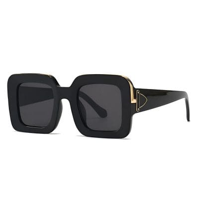 Black oversized designer sunglasses with gold accents for women and men, perfect for fashion and sun protection at Monalisa Store.