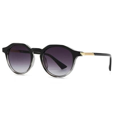 Stylish black cat-eye sunglasses with gradient lenses and gold accents, perfect for fashion-forward eyewear shoppers.