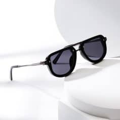 Stylish black sunglasses with tinted lenses, ideal for fashion and sun protection from Monalisa Store's optical collection.