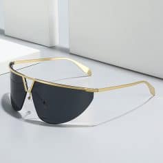 Luxury designer sunglasses with black tinted lenses and gold metal frame, fashionable eyewear for sun protection, Monalisa Store.