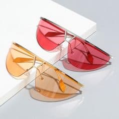 Bright red and orange fashion sunglasses with mirrored lenses, stylish design, trendy accessories, perfect for summer fashion and UV protection, available at Monalisa Store.