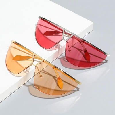 Bright red and orange fashion sunglasses with mirrored lenses, stylish design, trendy accessories, perfect for summer fashion and UV protection, available at Monalisa Store.