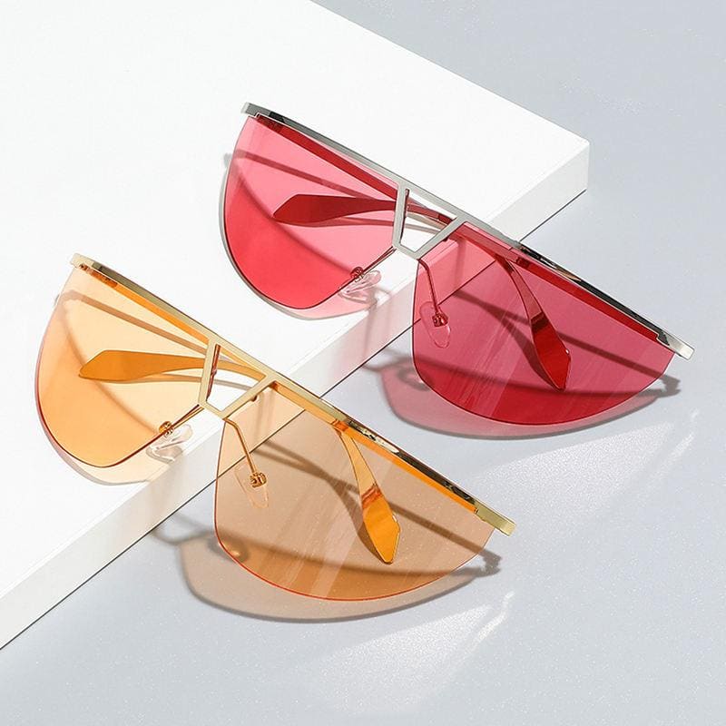 Bright red and orange fashion sunglasses with mirrored lenses, stylish design, trendy accessories, perfect for summer fashion and UV protection, available at Monalisa Store.