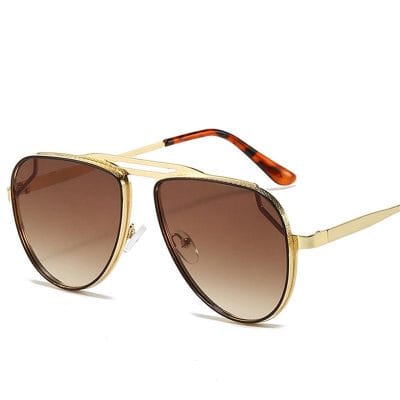 Luxurious gold-frame aviator sunglasses with brown gradient lenses, stylish tortoiseshell arms, perfect for women’s fashion accessories and UV protection.