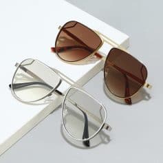 Sunglasses with stylish metal frames and tinted lenses, perfect for sun protection and fashion.