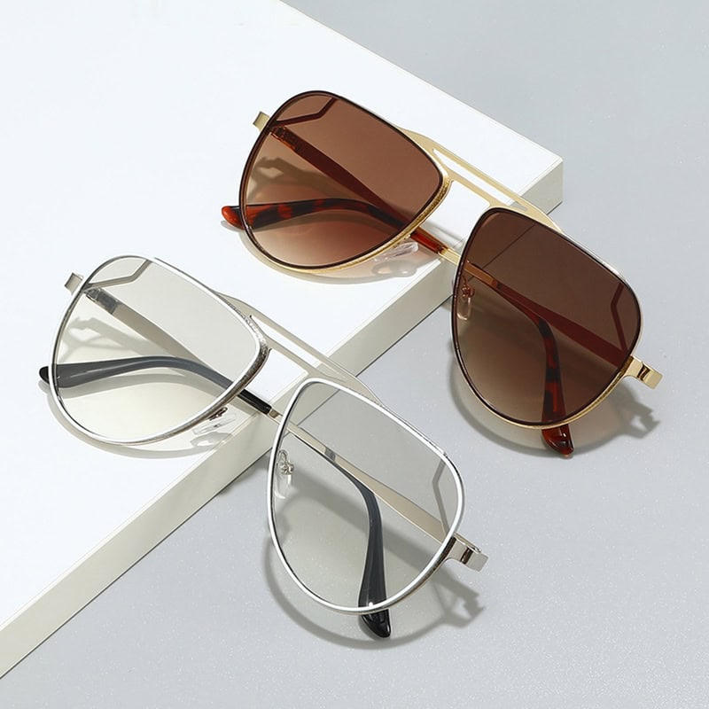 Sunglasses with stylish metal frames and tinted lenses, perfect for sun protection and fashion.