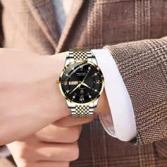 Luxurious men's two-tone gold and silver wristwatch with black dial, Roman numerals, and date display, perfect for elegant fashion and timekeeping.