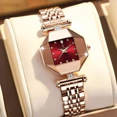 Luxurious rose gold designer wristwatch with a red dial, diamond accents, and elegant bracelet, perfect for women seeking high-end fashion jewelry at Monalisa Store.