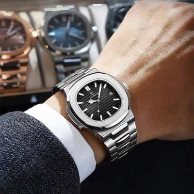 Luxurious stainless steel wristwatch with black dial and modern design, perfect for men and women, ideal for fashion and everyday accessories.