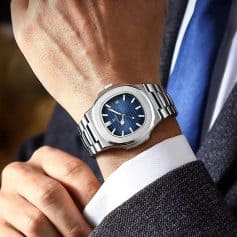 Luxury stainless steel wristwatch with blue dial, date display, and modern design for men and women. Perfect for professional and everyday wear.