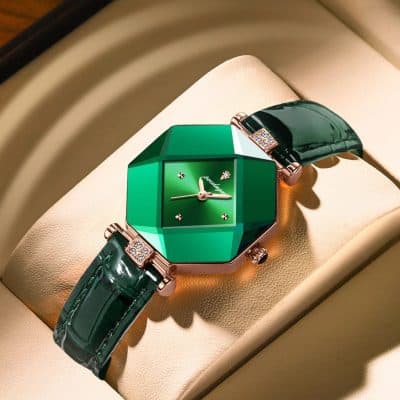 Luxurious green gemstone design watch with a leather strap, elegant diamond accents, perfect for fashionable accessories and statement jewelry.