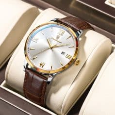 Elegant luxury wristwatch with a white dial, gold accents, Roman numerals, and a brown leather strap, perfect for men’s fashion and style.