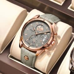 Luxury men's wristwatch with rose gold case and grey leather strap, showcasing chronograph features and elegant design. Perfect for stylish accessories and timepieces collection.