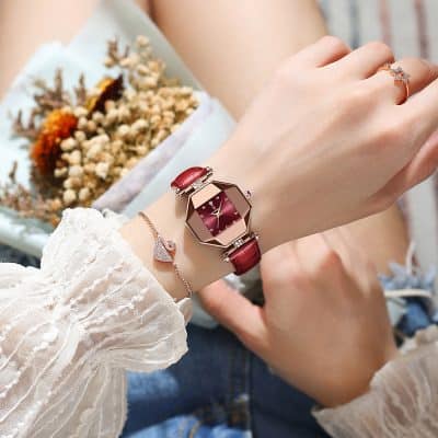 Elegant women's wristwatch with a red leather strap and rose gold case, perfect for fashion accessories and luxury jewelry.