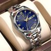 Luxury men's wristwatch with a blue dial, gold accents, and stainless steel band, showcasing elegant design and craftsmanship.